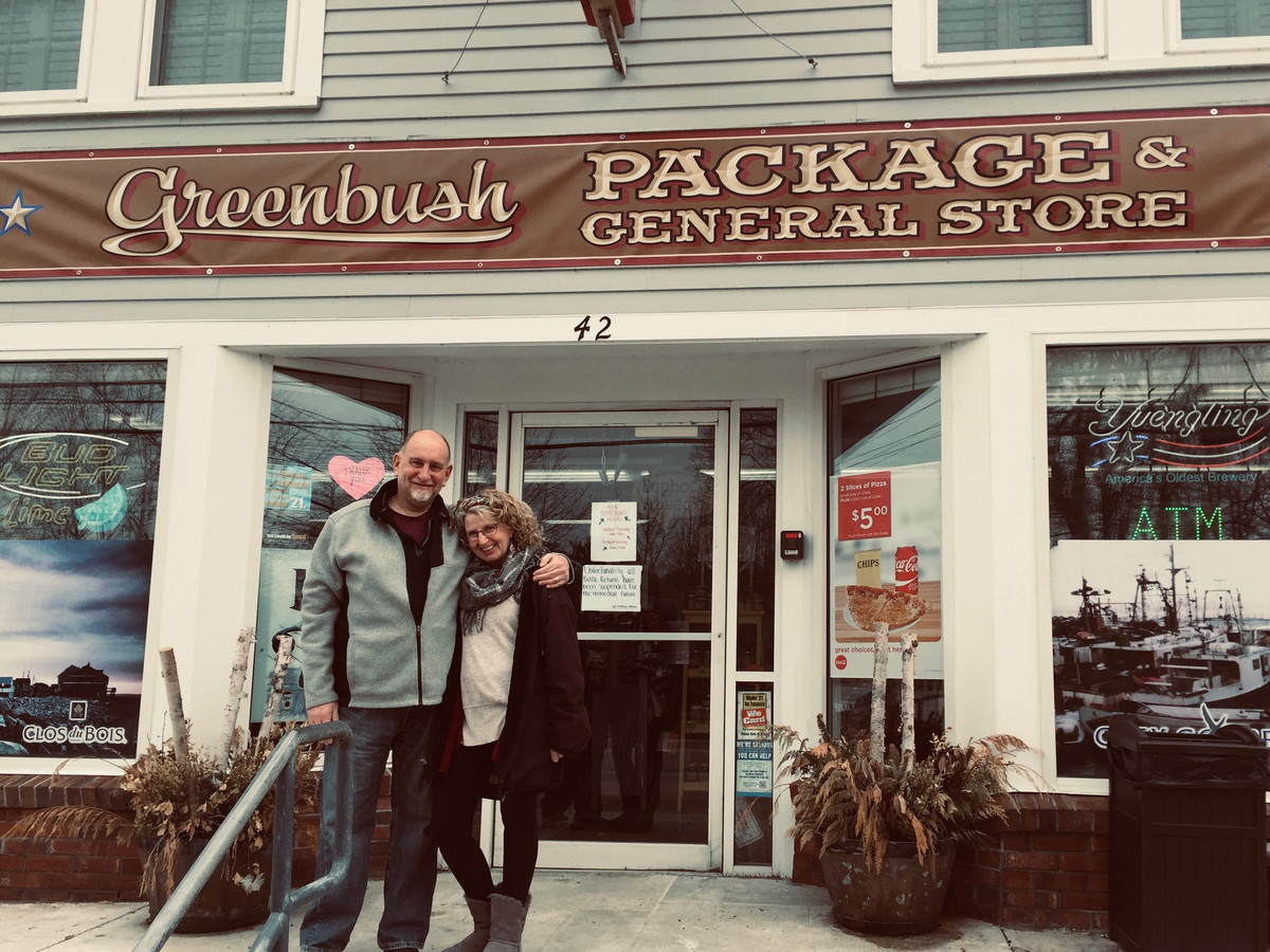Greenbush Package Store exterior with owners